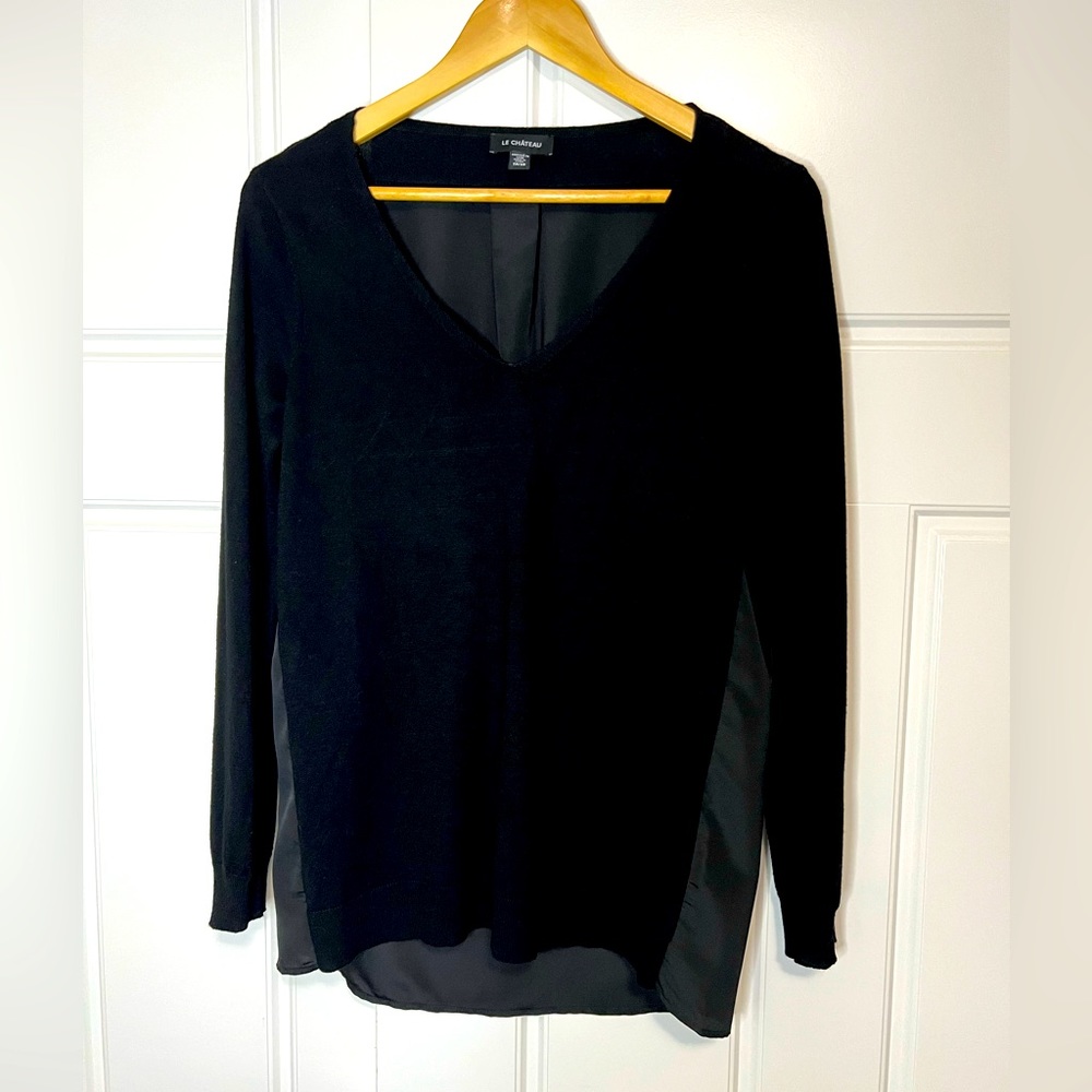 La Chateau V-Neck lightweight sweater with sleek back.